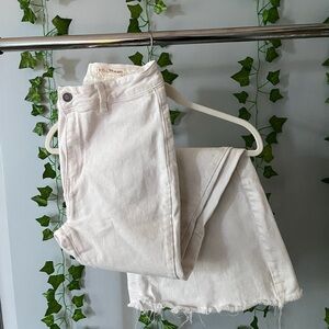 Super cute and iconic white flare jeans